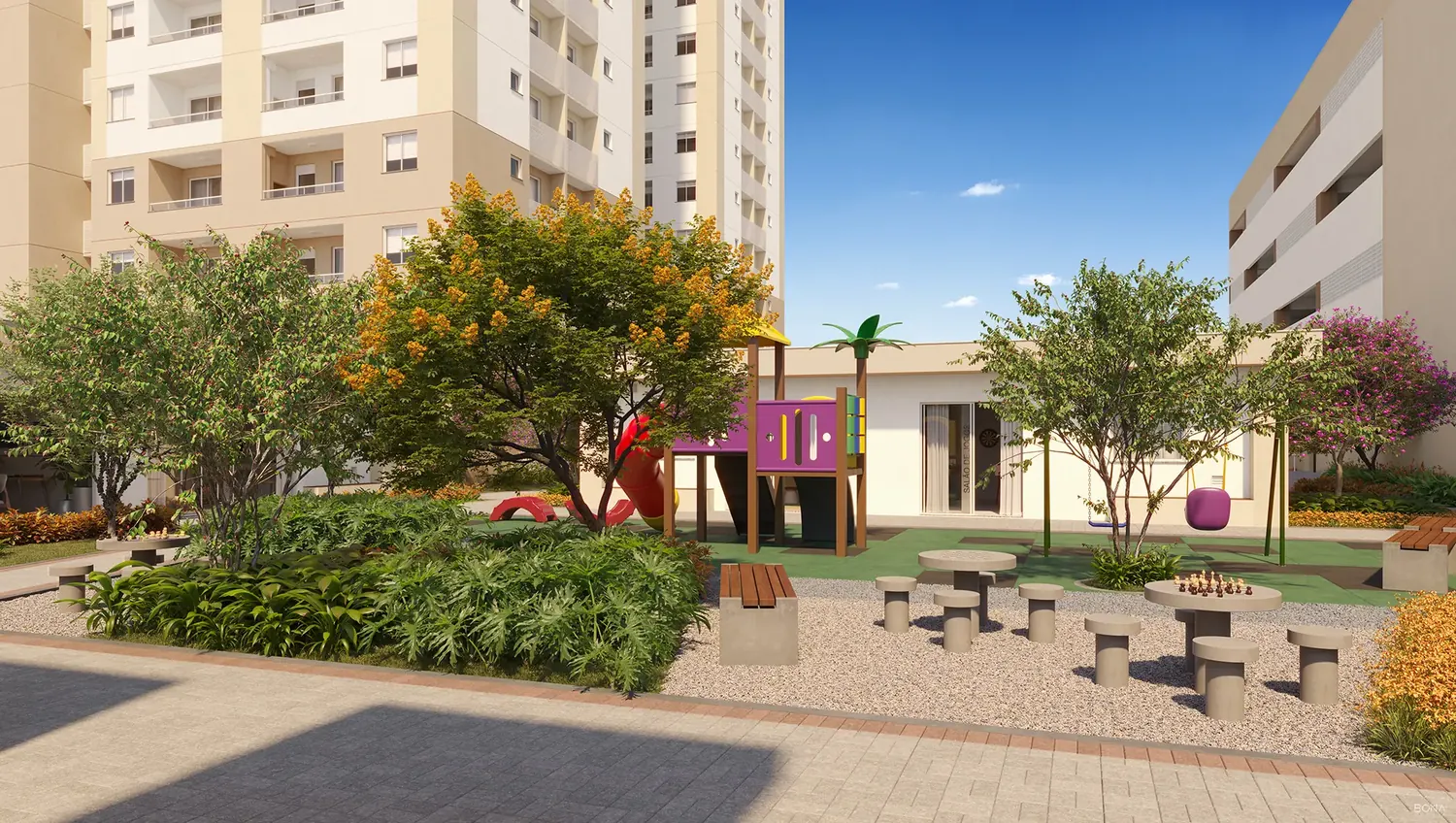 Praça ajardinada com bancos e playground ao fundo