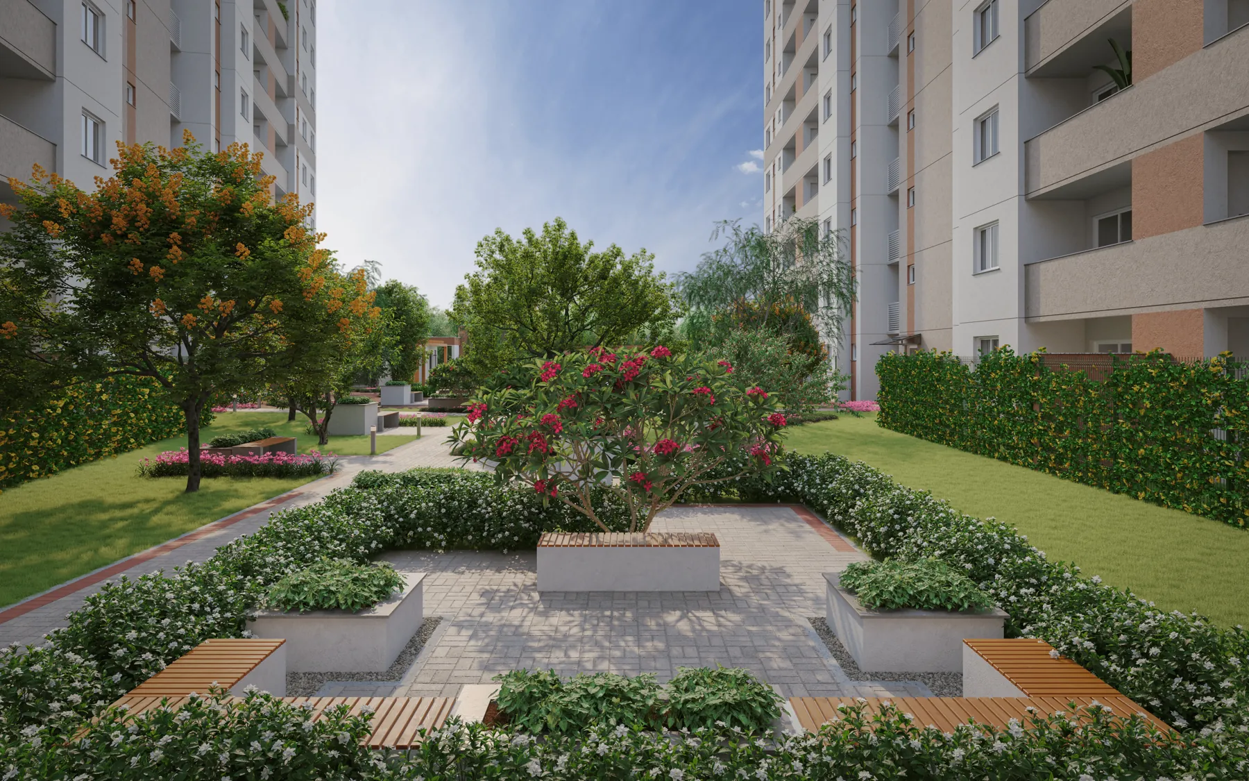 Praça com bancos e jardins entre as torres