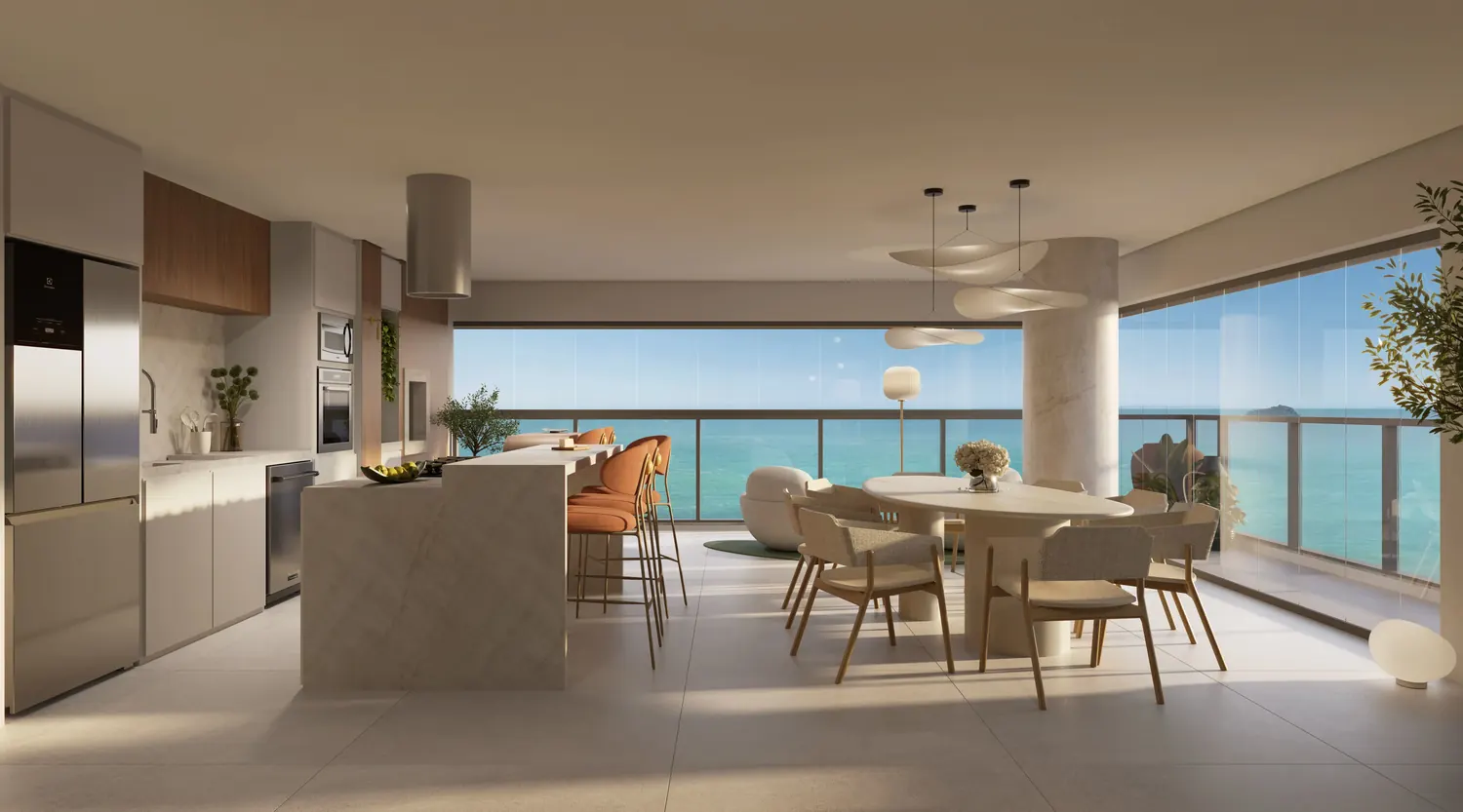 Cozinha com ilha integrada ao jantar e vista para o mar