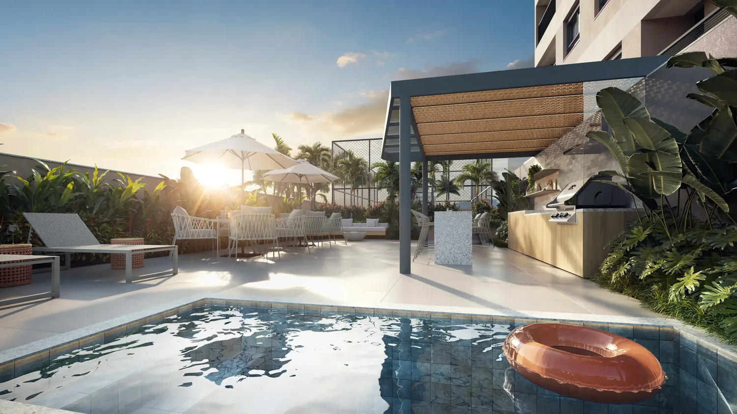 Piscina ao pôr do sol com deck, pergolado e churrasqueira