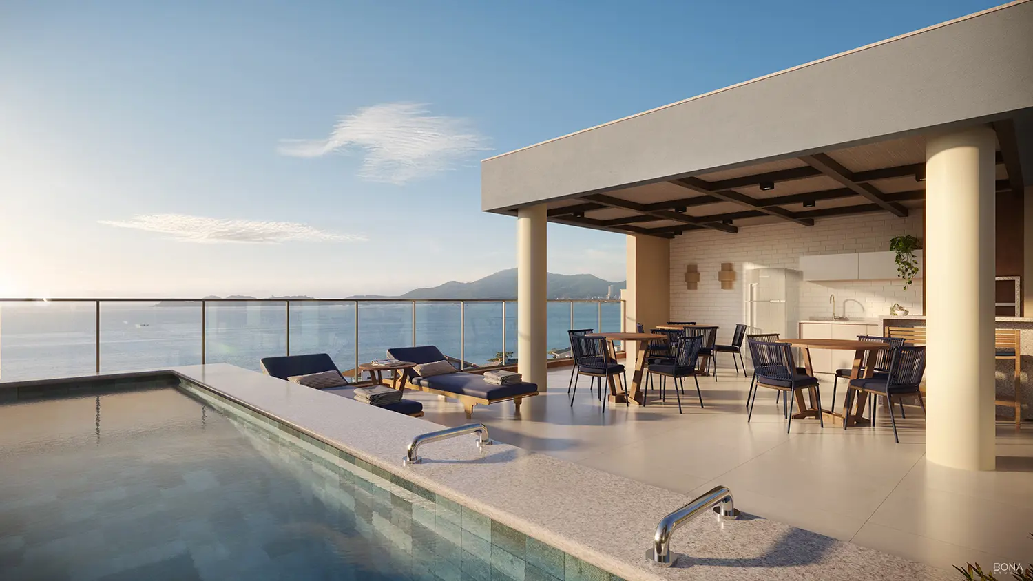 Deck da piscina com espreguiçadeiras e vista para o morro