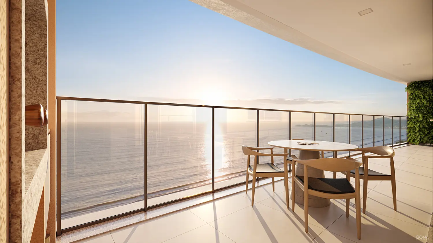 Sacada com mesa de jantar e vista aberta para o mar